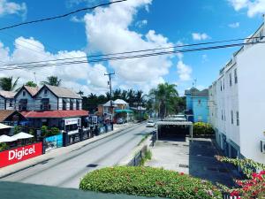 a view of a street in a small town at Beach Vue Barbados in Bridgetown