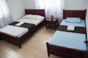 Letto o letti in una camera di Hotel Joohn Gay only LGBTIQ