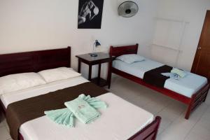 Letto o letti in una camera di Hotel Joohn Gay only LGBTIQ