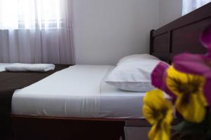 Letto o letti in una camera di Hotel Joohn Gay only LGBTIQ