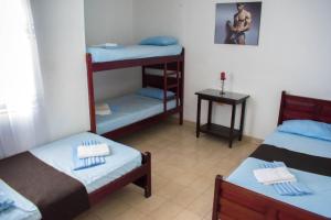 Letto o letti in una camera di Hotel Joohn Gay only LGBTIQ