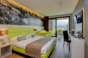 Posteľ alebo postele v izbe v ubytovaní Hotel La Fiorita