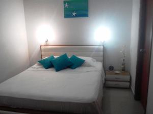 Cama o camas de una habitación en Costa Azul Suites Apartamento 603