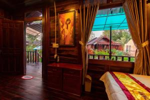 Кровать или кровати в номере Anna Pham Bungalow - Friendly Local +29 фотографий