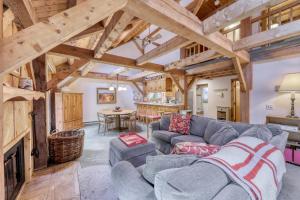 a living room with a couch and a table at Sherwood Escape in Londonderry