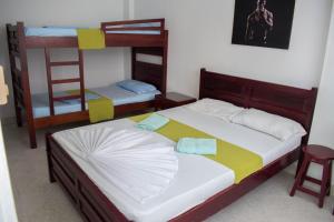 Letto o letti in una camera di Hotel Joohn Gay only LGBTIQ