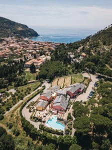 
a large body of water with trees and buildings at Park Hotel Argento in Levanto
