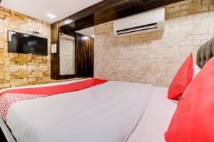 Postel nebo postele na pokoji v ubytování Hotel Qamar