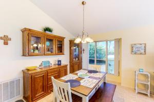a kitchen with a table and a dining room at Long Island Village Unit 111 in Port Isabel