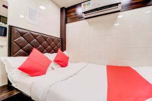 Postel nebo postele na pokoji v ubytování Hotel Qamar