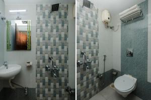 Koupelna v ubytování Hotel Amber-colaba