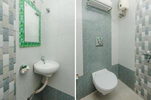 Koupelna v ubytování Hotel Amber-colaba