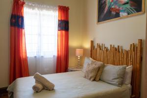 Postel nebo postele na pokoji v ubytování Bay Vista Guesthouse