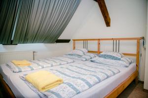 Postel nebo postele na pokoji v ubytování Villa Carpe Diem