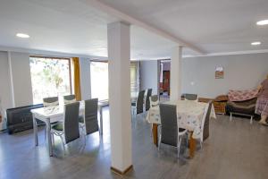 a dining room with a table and chairs at Holiday Home Ekaterine in Telavi