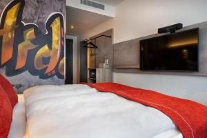 Postel nebo postele na pokoji v ubytování Holiday Inn - the niu, Hide Berlin Friedrichshain by IHG