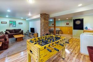 a living room with a foosball table at Ridge View Retreat - 3 Bed 2 Bath Vacation home in Lake Wenatchee in Leavenworth