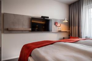 Postel nebo postele na pokoji v ubytování Holiday Inn - the niu, Hide Berlin Friedrichshain by IHG