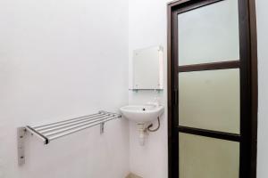 Baðherbergi á Hotel Wismancala Kaliurang