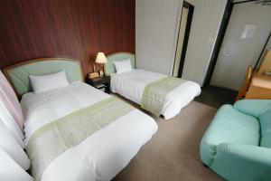 Postel nebo postele na pokoji v ubytování Hotel Ra Kuun