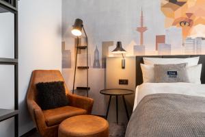 Cama ou camas em um quarto em Holiday Inn - the niu, Charly Frankfurt City by IHG