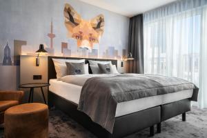 Cama ou camas em um quarto em Holiday Inn - the niu, Charly Frankfurt City by IHG mais 37 fotos