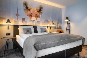 Cama ou camas em um quarto em Holiday Inn - the niu, Charly Frankfurt City by IHG