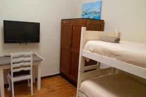 Postel nebo postele na pokoji v ubytování Bay Vista Guesthouse