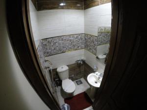 Koupelna v ubytování City Hotel