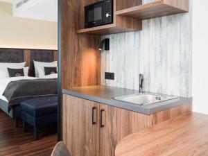 Postel nebo postele na pokoji v ubytování Holiday Inn - the niu, Saddle Fürth by IHG