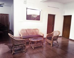 Posezení v ubytování Hill Mist Thekkady