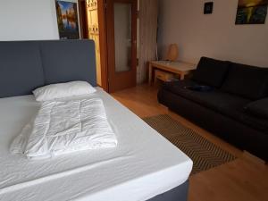 Postel nebo postele na pokoji v ubytování Apartment am Hafen