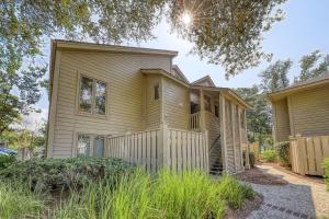 a house with a fence in front of it at St Andrews Common in Hilton Head Island