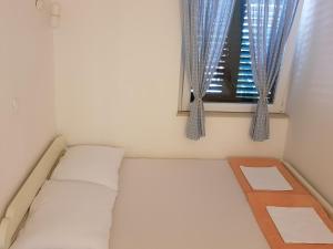 Postel nebo postele na pokoji v ubytování Apartment Vesna