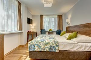 Posteľ alebo postele v izbe v ubytovaní Hotel Książ