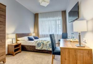 Posteľ alebo postele v izbe v ubytovaní Hotel Książ