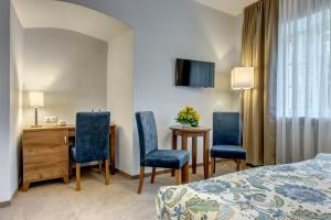 Posteľ alebo postele v izbe v ubytovaní Hotel Książ