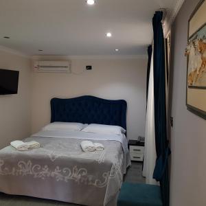 Postel nebo postele na pokoji v ubytování Hotel Erandi