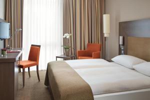 Postel nebo postele na pokoji v ubytování IntercityHotel Berlin Hauptbahnhof + 37 fotografií