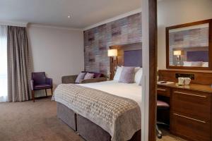 En eller flere senge i et værelse på Invercarse Hotel Dundee, BW Signature Collection
