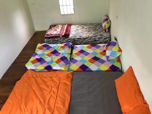 Postel nebo postele na pokoji v ubytování Bao Loc Homestay