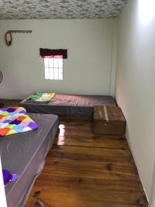Postel nebo postele na pokoji v ubytování Bao Loc Homestay