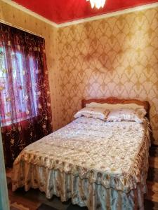 En eller flere senge i et værelse på Посуточная аренда в центре Кропивницкого