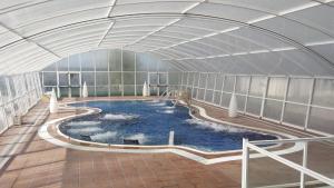 Bazén v ubytování Hotel Doña Brígida – Salamanca Forum nebo v jeho okolí