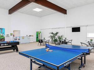 a room with a ping pong table in it at 6 person holiday home in Brovst in Brovst