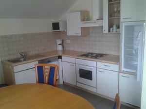 Kuchyň nebo kuchyňský kout v ubytování Ferienhaus Dorfruhe