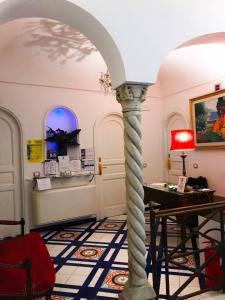 O bucătărie sau chicinetă la Hotel Croce Di Amalfi