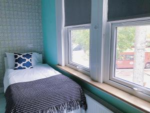 Postel nebo postele na pokoji v ubytování Caspian Hotel