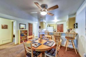 a kitchen and dining room with a table and chairs at Sonoma Getaway in McCall