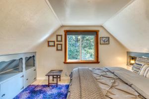 a bedroom with a large bed and a window at Cozy Cottage in Florence